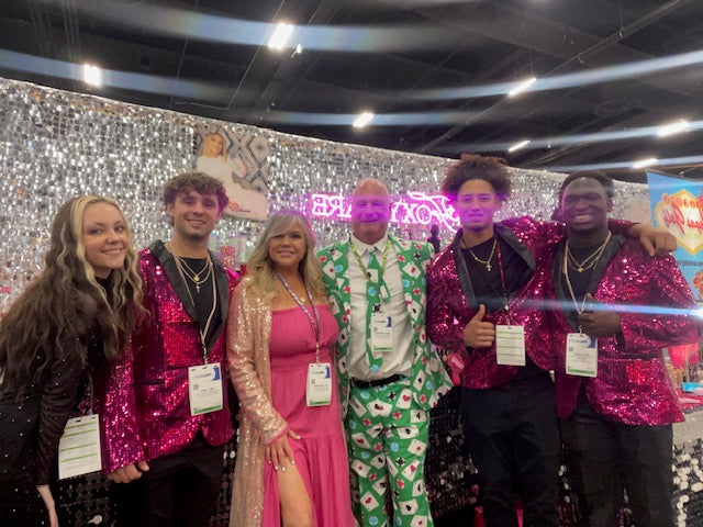 See our FUN uniforms we can wear at your booth!
